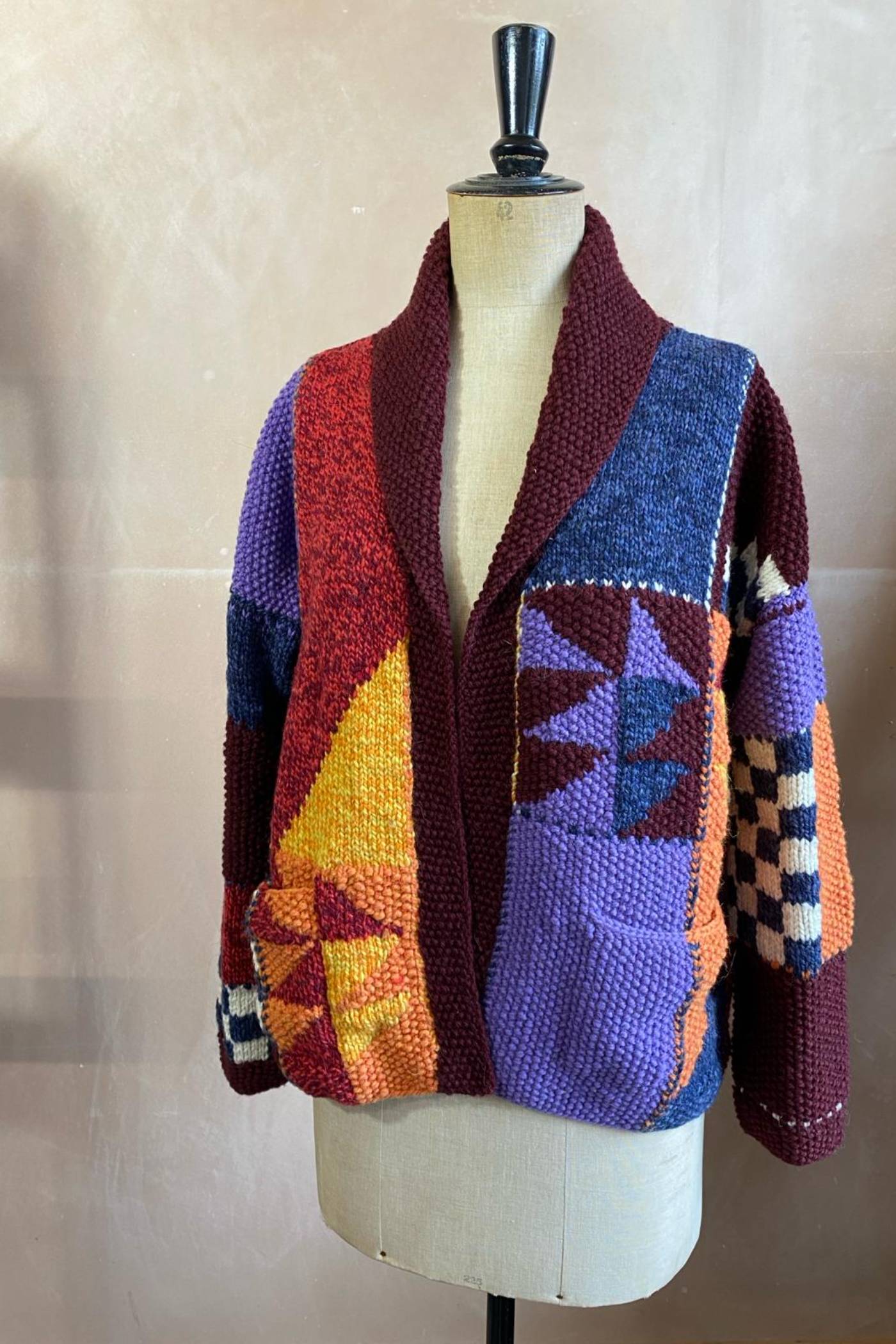 Geo Patchwork Wool Cardigan in Baked Red Light