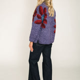 amano sunflower wool jumper in purple with red flowers women back 1